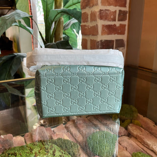 GUCCI Small Light Blue Patent GG Emblem Bucket Bag