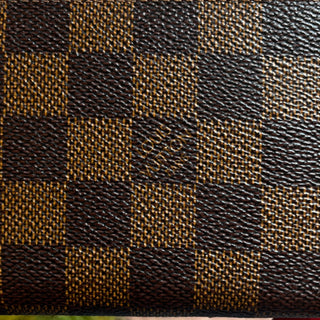 LOUIS VUITTON Damier Ebene Coated Canvas Zippy Wallet