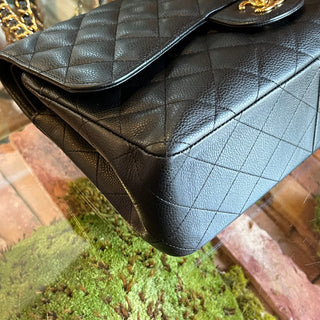 CHANEL Jumbo Double Flap Black Caviar Quilted Leather Shoulder Bag ADI1191