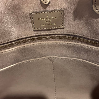 LOUIS VUITTON OnTheGo MM Bicolor Empreinte Giant Monogram Tote Bag