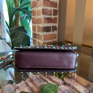 VALENTINO GARAVANI Maroon Rockstud Rolling Guitar Strap Crossbody Bag