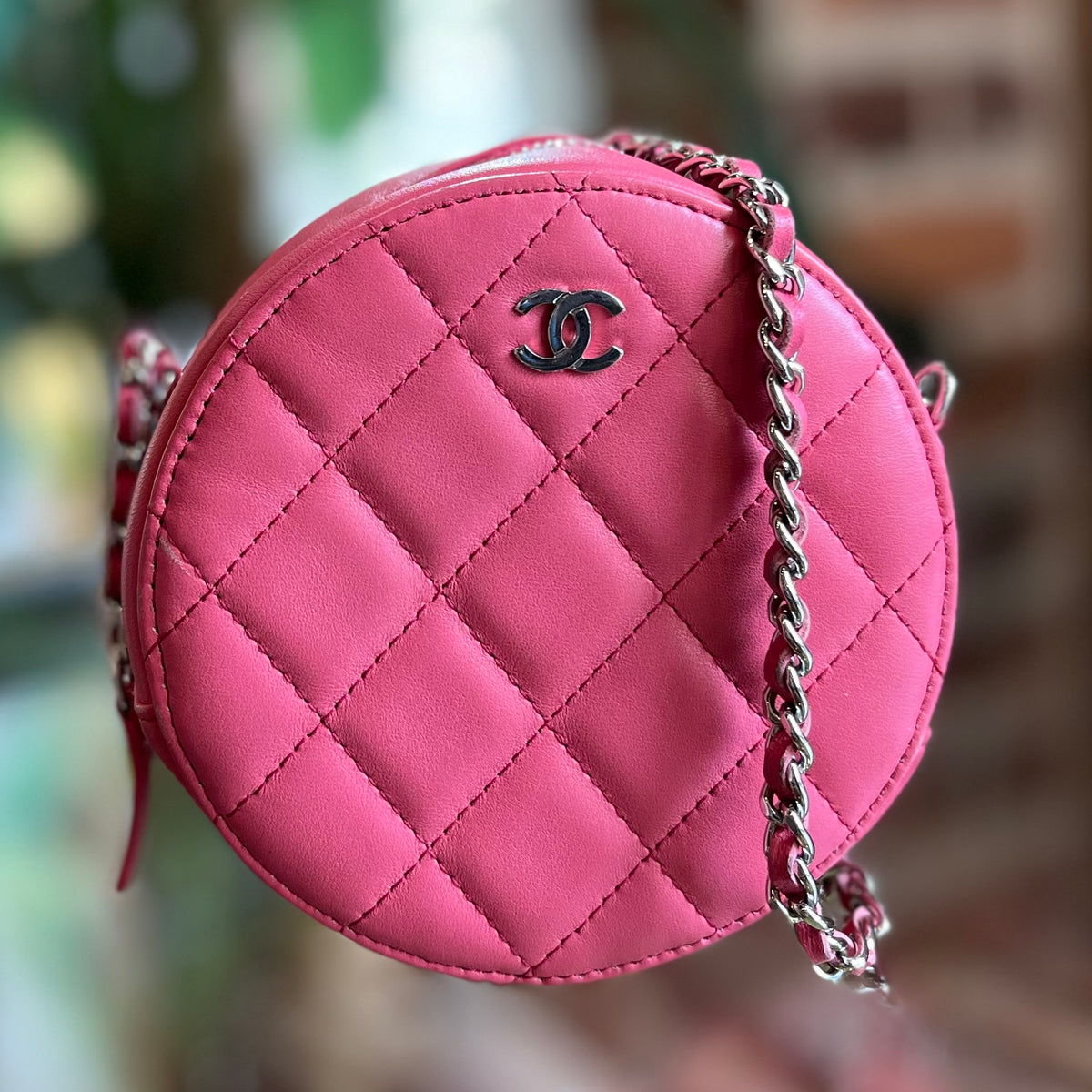 CHANEL Pink Lambskin Quilted Round Mini Pouch