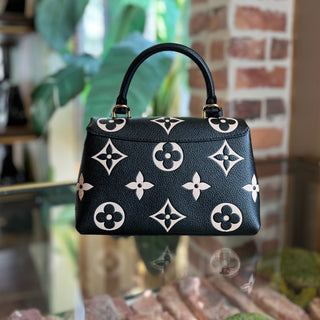 LOUIS VUITTON Madeleine BB Empreinte Monogram Giant Top Handle