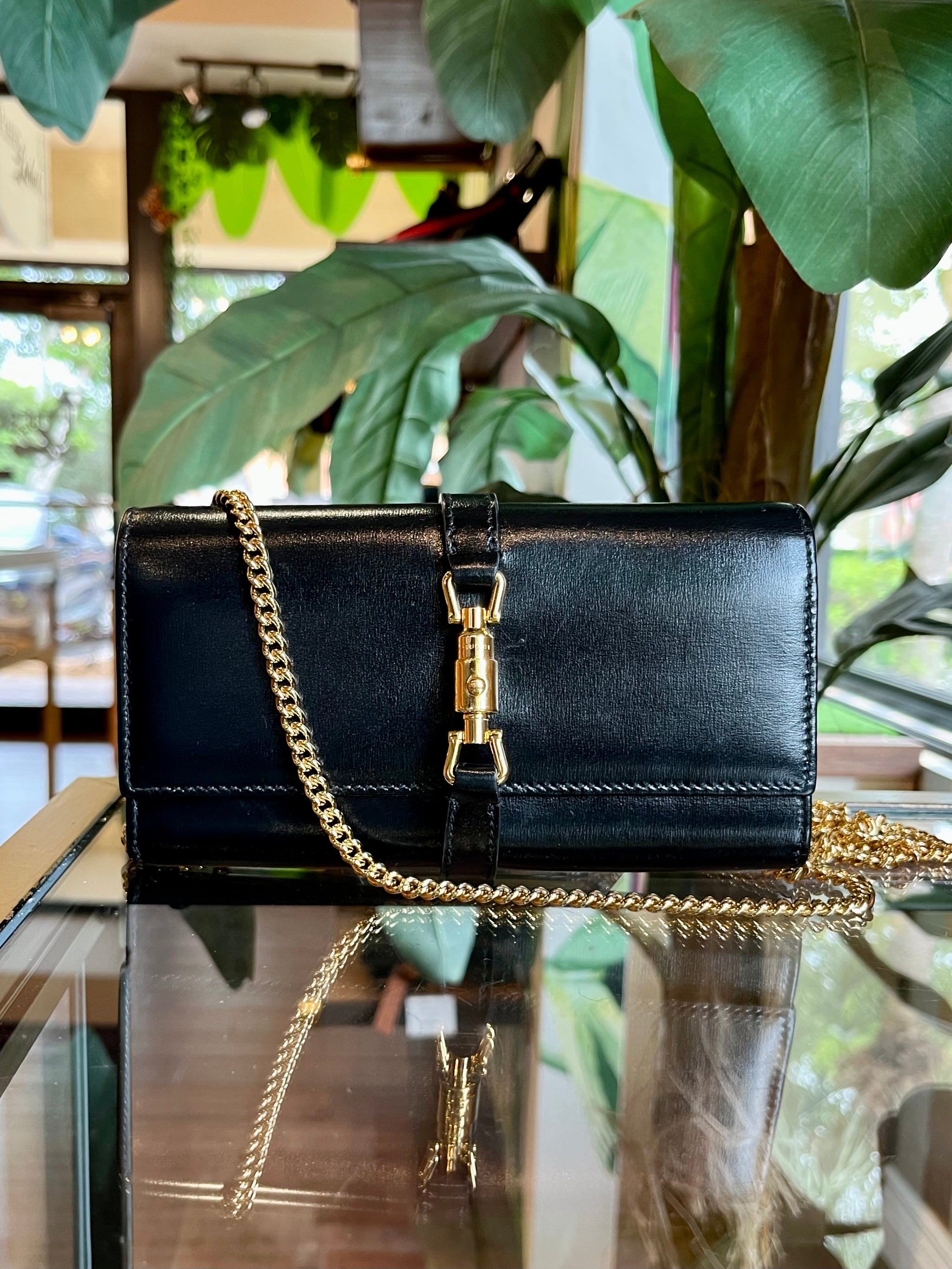 Wallet On Chain - Black leather mini-bag