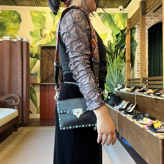 VALENTINO GARAVANI Mini Rolling Rockstud Pebbled Calfskin Flip-Lock Crossbody Bag