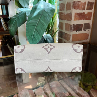 LOUIS VUITTON Onthego PM Creme Bois de Rose Giant Monogram Empreinte Leather Tote Bag