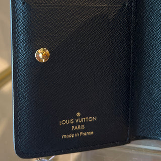 LOUIS VUITTON Lou Reversible Monogram Wallet
