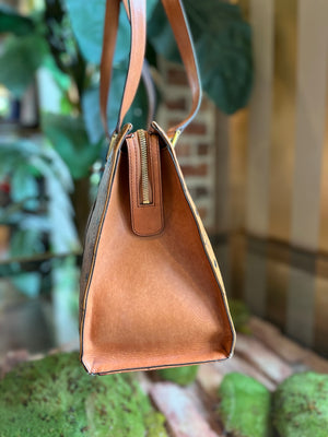 Sold at Auction: MCM Cognac Visetos Coated Canvas Barrel Bag, with brushed  gold hardware, opening to a cognac silk lined interior with a small zip  co