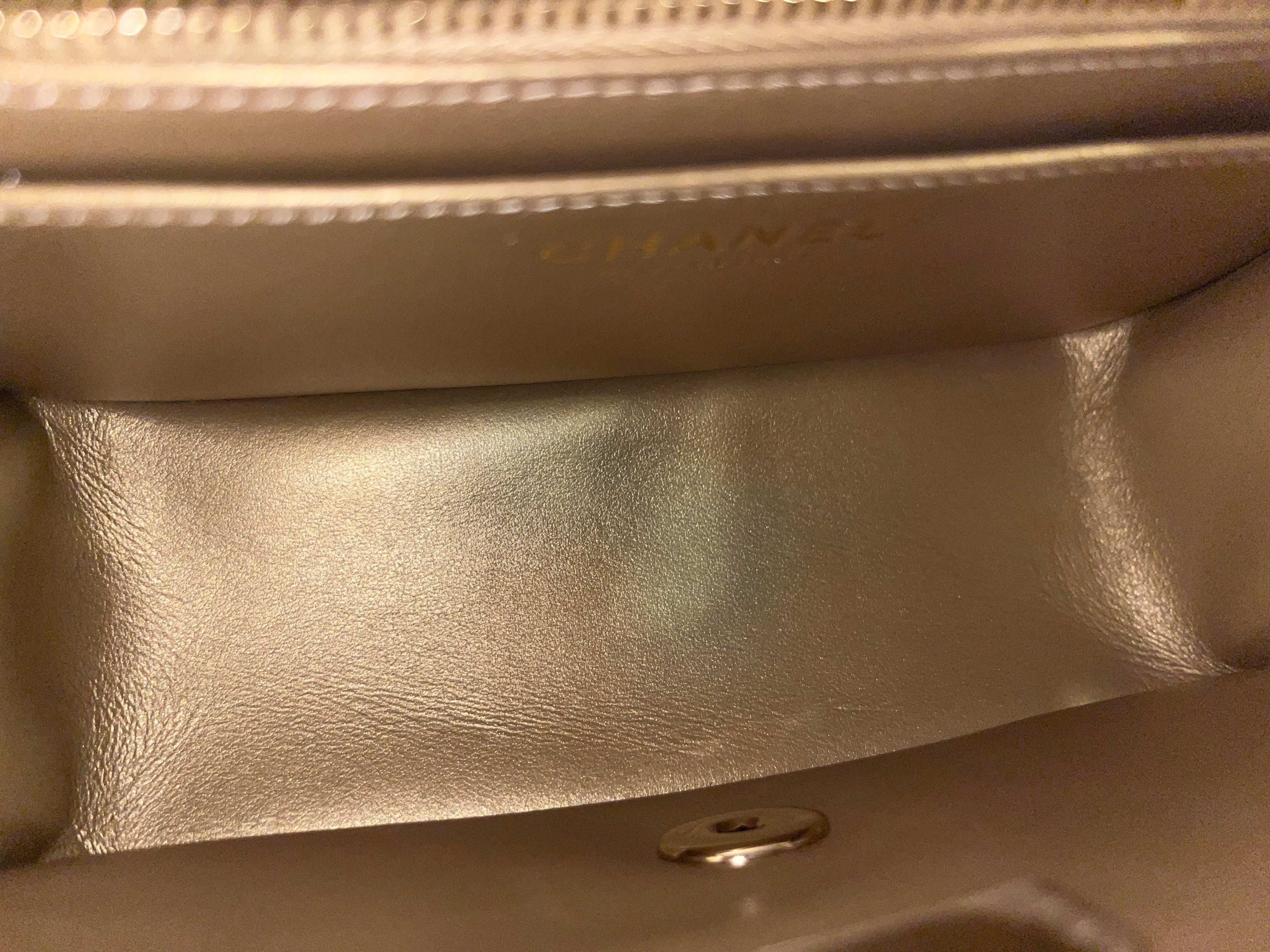 white chanel top handle bag vintage