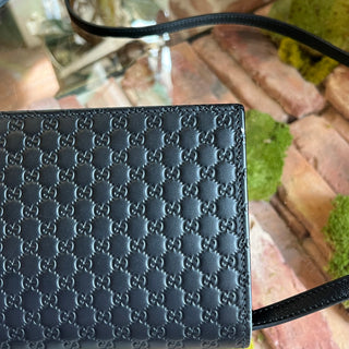 GUCCI Black Microguccissima Leather Crossbody