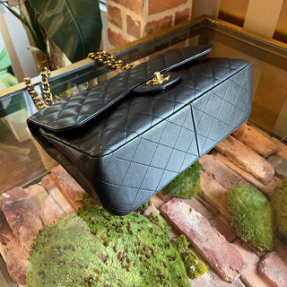 CHANEL Jumbo Double Flap Black Caviar Quilted Leather Shoulder Bag ADI1191