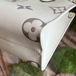 LOUIS VUITTON Onthego PM Creme Bois de Rose Giant Monogram Empreinte Leather Tote Bag