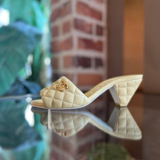 CHANEL Yellow Quilted Mules CC SZ 37 (US 7)