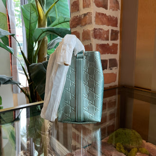 GUCCI Small Light Blue Patent GG Emblem Bucket Bag