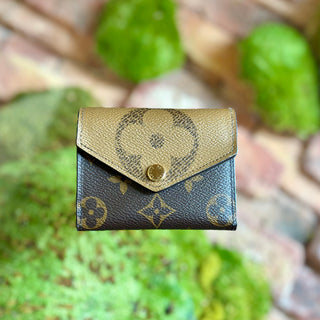 LOUIS VUITTON Reverse Monogram Zoe Wallet