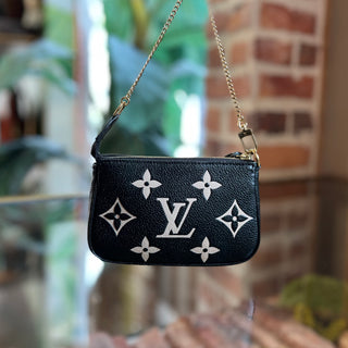 LOUIS VUITTON Pochette Accessories Mini Bicolor Monogram Empreinte Giant Handbag