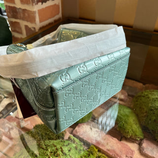 GUCCI Small Light Blue Patent GG Emblem Bucket Bag