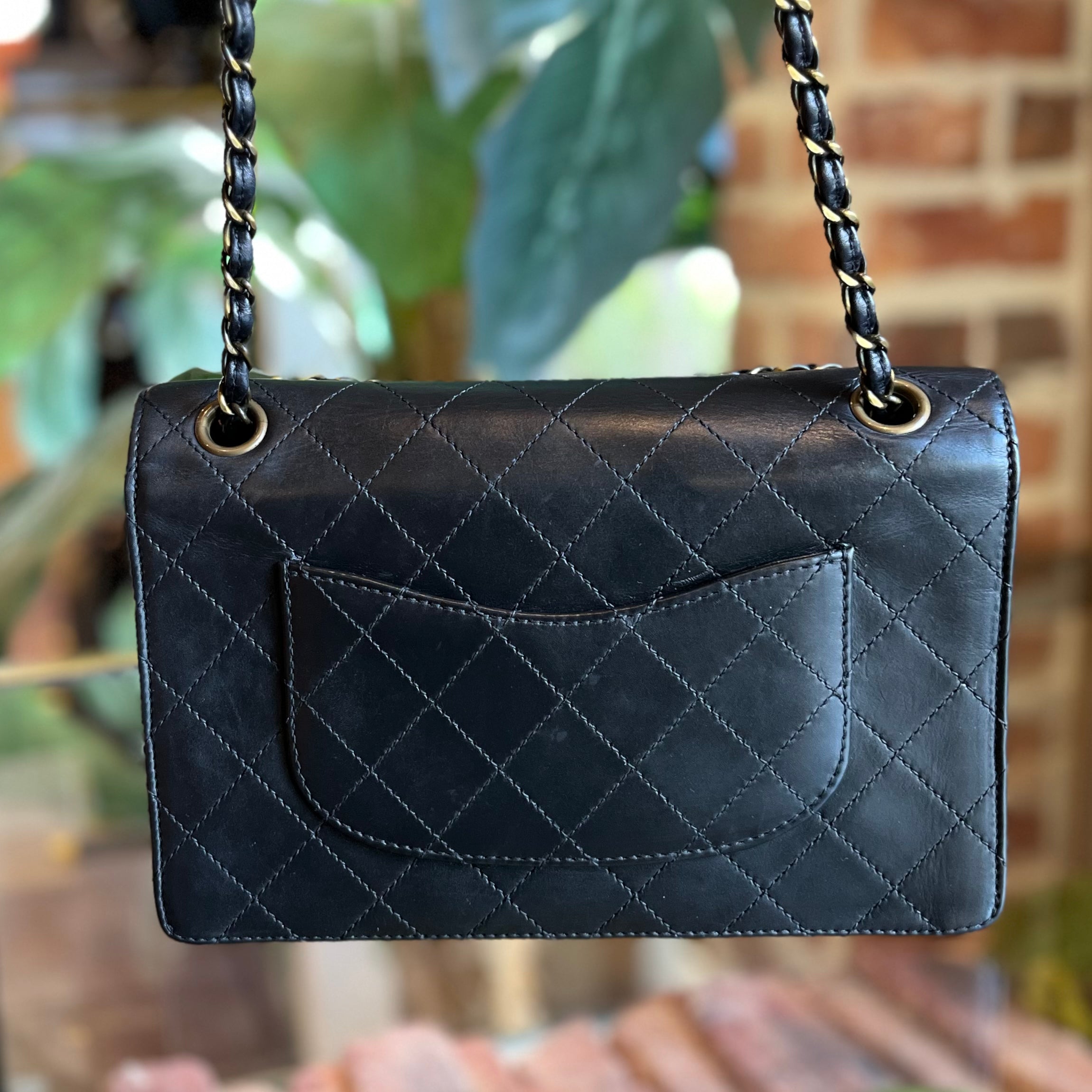vintage black chanel quilted bag leather