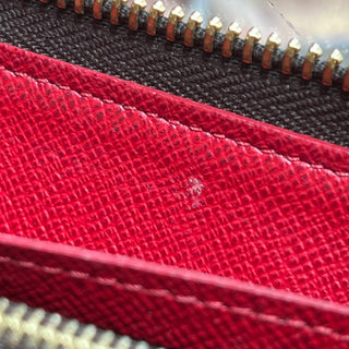 LOUIS VUITTON Damier Ebene Coated Canvas Zippy Wallet