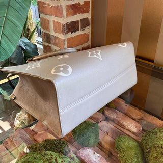 LOUIS VUITTON OnTheGo MM Bicolor Empreinte Giant Monogram Tote Bag