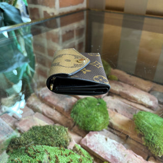 LOUIS VUITTON Reverse Monogram Zoe Wallet