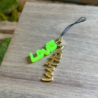 LOUIS VUITTON Green Louis Vuitton Lettering Gold Tone Bag Charm