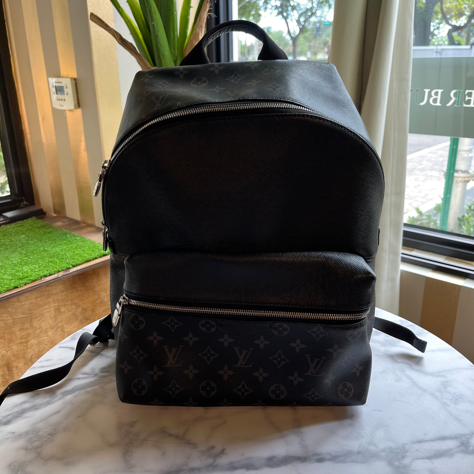 LOUIS VUITTON Black Eclipse Discovery PM Backpack