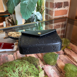 GUCCI Black Super Mini Pochette Black GG Embossed Leather Crossbody Bag