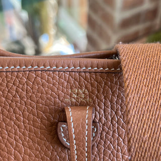 HERMÈS Evelyne TPM Gold Taurillon Clemence Leather Crossbody Bag