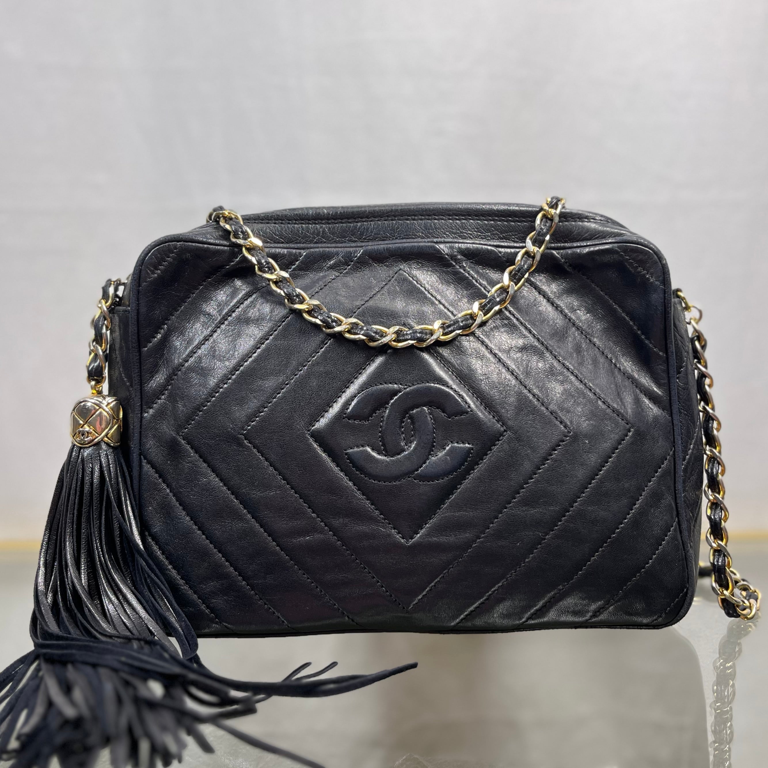 CHANEL Black Lambskin Chevron Quilted Tassel Camera Case