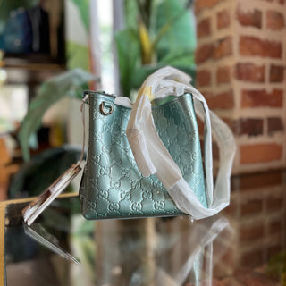 GUCCI Small Light Blue Patent GG Emblem Bucket Bag