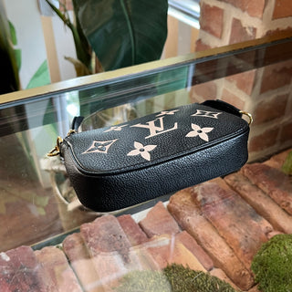 LOUIS VUITTON Pochette Accessories Mini Bicolor Monogram Empreinte Giant Handbag